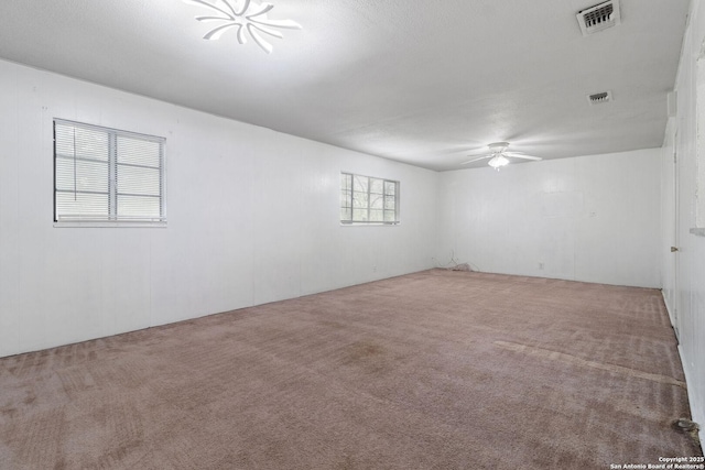123 Haby Dr, San Antonio, TX 78212 - unfurnished room featuring ceiling fan, carpet, and visible vents