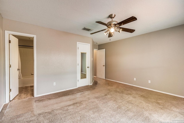 6611 Millrock, Live Oak, TX 78233 - unfurnished bedroom featuring visible vents, baseboards, a ceiling fan, and carpet