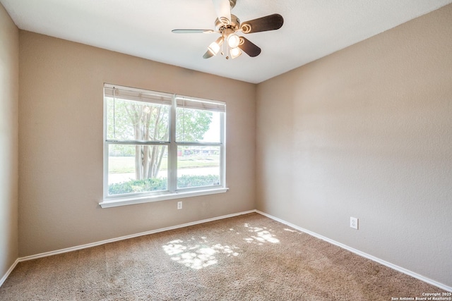 6611 Millrock, Live Oak, TX 78233 - unfurnished room with baseboards, a ceiling fan, and carpet floors