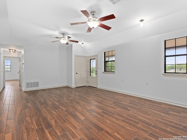 601 Wildflower Dr, Lytle, TX 78052 - unfurnished living room featuring a healthy amount of sunlight, a ceiling fan, and visible vents