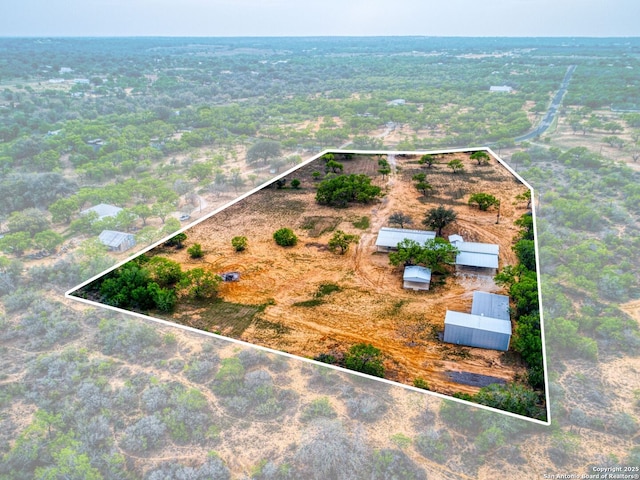 601 Wildflower Dr, Lytle, TX 78052 - birds eye view of property featuring a rural view