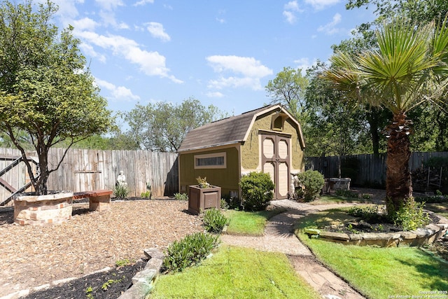 view of shed featuring a fenced backyard