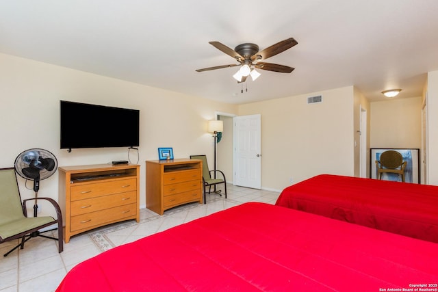 71 W Nassau Unit 302, Rockport, TX 78382 - bedroom with light tile patterned floors, ceiling fan, and visible vents