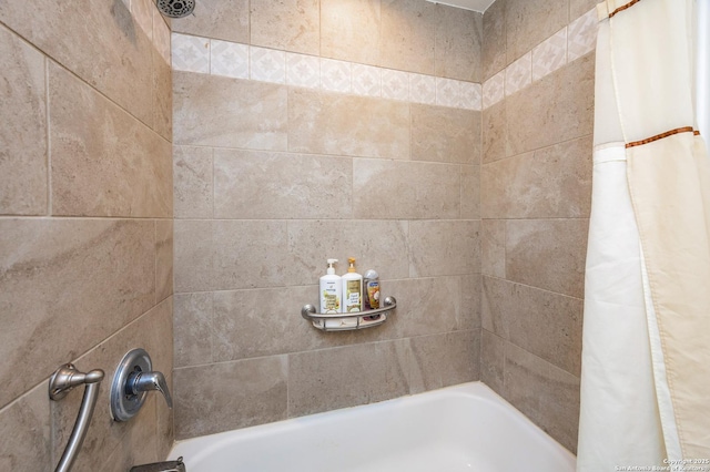 71 W Nassau Unit 302, Rockport, TX 78382 - full bathroom featuring shower / bath combo with shower curtain