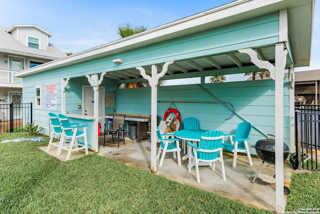 71 W Nassau Unit 302, Rockport, TX 78382 - view of patio / terrace featuring fence