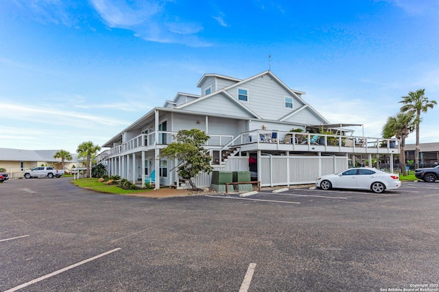 71 W Nassau Unit 302, Rockport, TX 78382 - view of building exterior with uncovered parking