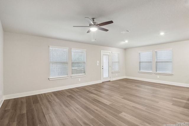 17110 Autry Fls, San Antonio, TX 78247 - spare room featuring wood finished floors, a ceiling fan, and recessed lighting