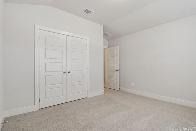 17114 Autry Fls, San Antonio, TX 78247 - unfurnished bedroom featuring carpet floors, a closet, and lofted ceiling