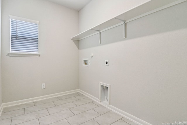 11534 Cottage Pt, San Antonio, TX 78254 - laundry room featuring gas dryer hookup, washer hookup, hookup for an electric dryer, and light tile patterned floors