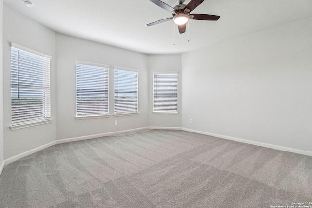 11534 Cottage Pt, San Antonio, TX 78254 - empty room with carpet flooring, ceiling fan, plenty of natural light, and a smoke detector