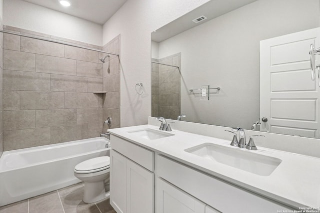 11538 Cottage Pt, San Antonio, TX 78254 - full bathroom with double vanity, bathing tub / shower combination, tile patterned floors, and recessed lighting