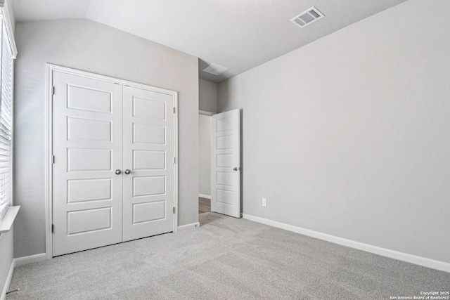 11538 Cottage Pt, San Antonio, TX 78254 - unfurnished bedroom with carpet, a closet, and vaulted ceiling