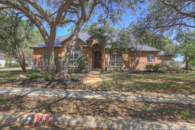 1780 Oak Frst, New Braunfels, TX 78132 - ranch-style home featuring metal roof and a standing seam roof