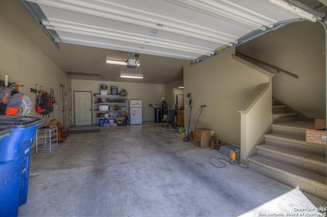 1780 Oak Frst, New Braunfels, TX 78132 - garage with a garage door opener