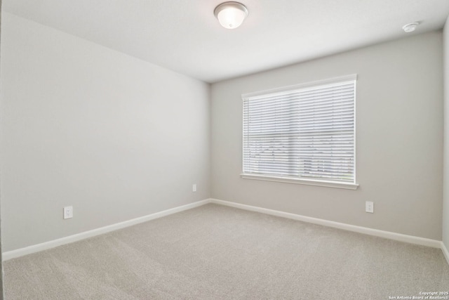 11530 Cottage Pt, San Antonio, TX 78254 - empty room with a smoke detector and carpet