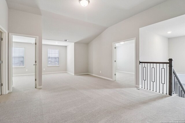 11530 Cottage Pt, San Antonio, TX 78254 - empty room featuring carpet flooring and vaulted ceiling