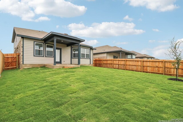 11530 Cottage Pt, San Antonio, TX 78254 - back of property with a fenced backyard and a patio area