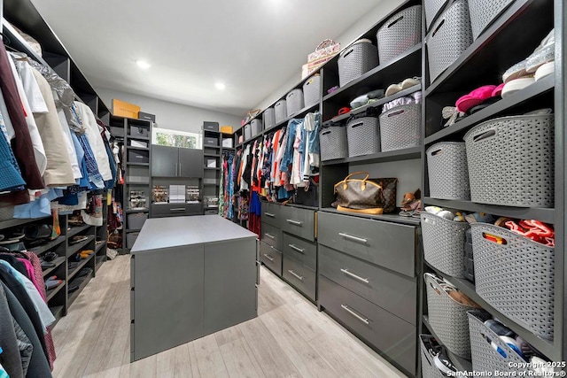 walk in closet featuring light wood finished floors