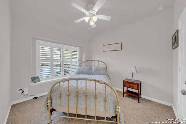 carpeted bedroom featuring baseboards, a ceiling fan, and lofted ceiling