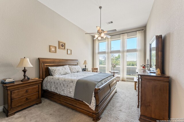 581 Vale Ct, New Braunfels, TX 78132 - bedroom with light carpet, ceiling fan, and visible vents