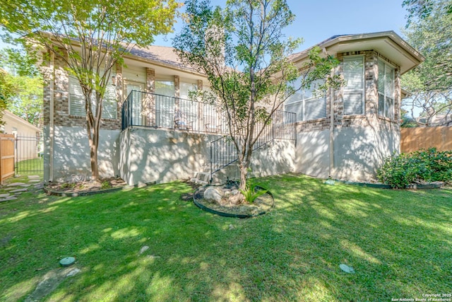 view of yard with fence
