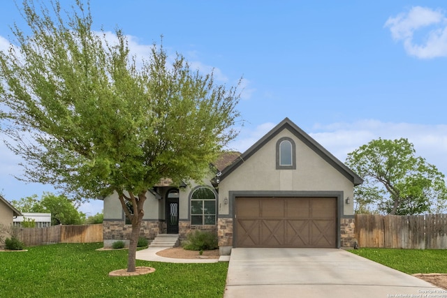 291 Strasbourg, Castroville, TX 78009 - view of front of property with stone siding, stucco siding, driveway, and a garage