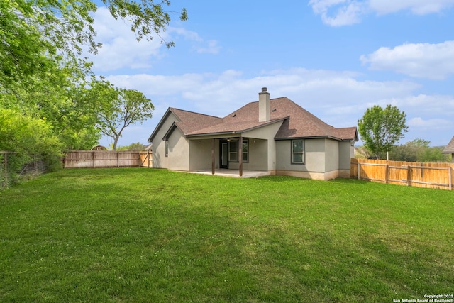 291 Strasbourg, Castroville, TX 78009 - back of property featuring stucco siding, a patio, a chimney, and a shingled roof