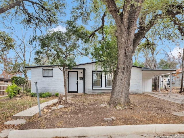 162 Birchwood, San Antonio, TX 78213 - view of front facade featuring a carport, driveway, fence, and brick siding