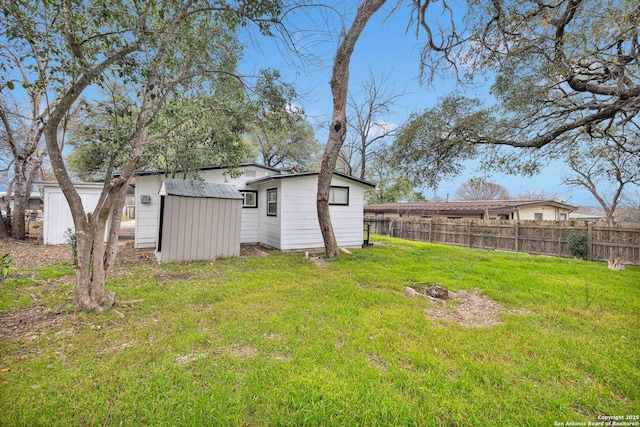 162 Birchwood, San Antonio, TX 78213 - view of yard with a storage shed, a fenced backyard, and an outdoor structure