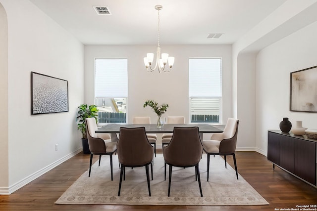 29991 Jove, Bulverde, TX 78163 - dining space with dark wood-style flooring, visible vents, baseboards, and an inviting chandelier
