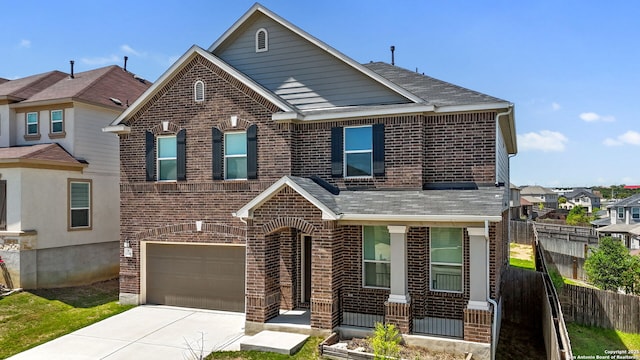 29991 Jove, Bulverde, TX 78163 - traditional-style house featuring roof with shingles, fence, brick siding, an attached garage, and concrete driveway