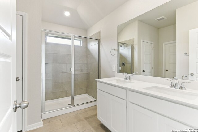 10214 King Robert, San Antonio, TX 78239 - bathroom featuring tile patterned flooring, a shower stall, double vanity, and recessed lighting