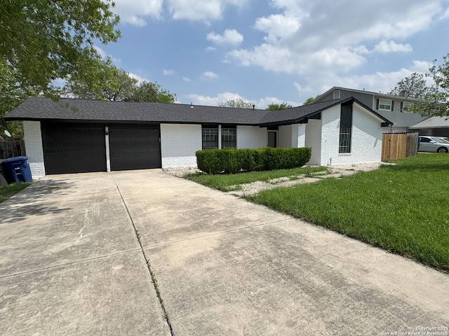2410 Townbreeze, San Antonio, TX 78238 - single story home with a garage, a front yard, concrete driveway, and brick siding