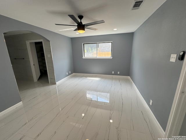2410 Townbreeze, San Antonio, TX 78238 - interior space featuring arched walkways, a ceiling fan, visible vents, marble finish floor, and baseboards