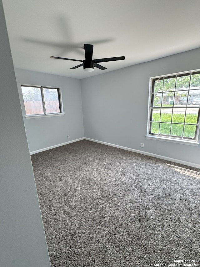 2410 Townbreeze, San Antonio, TX 78238 - empty room featuring baseboards, a ceiling fan, and dark colored carpet