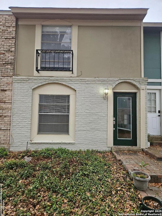 2811 Woodbury Dr Unit 304, San Antonio, TX 78217 - exterior space with brick siding and stucco siding