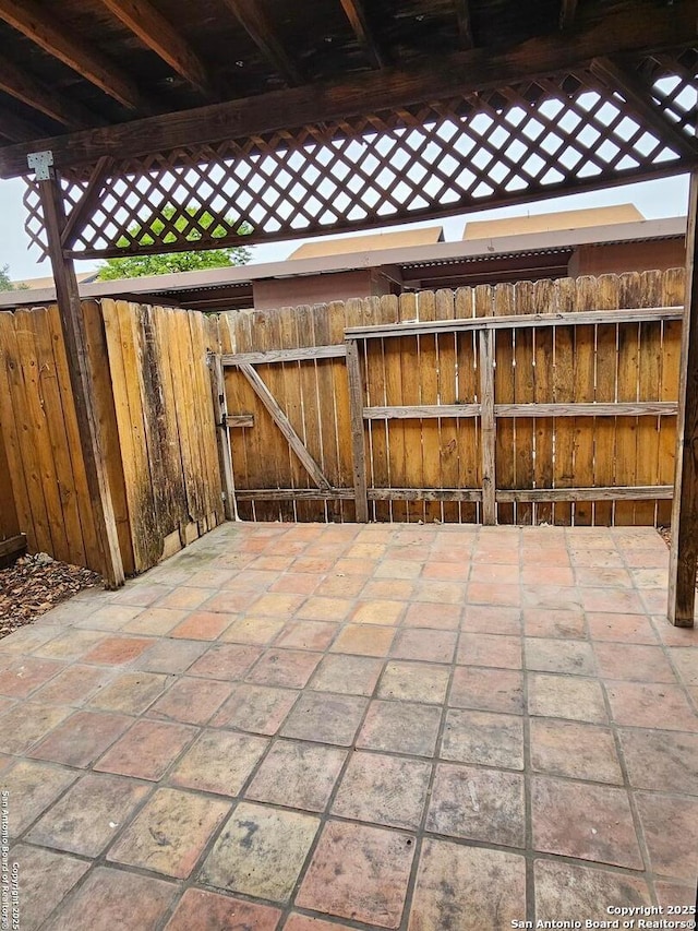 2811 Woodbury Dr Unit 304, San Antonio, TX 78217 - view of patio / terrace with fence