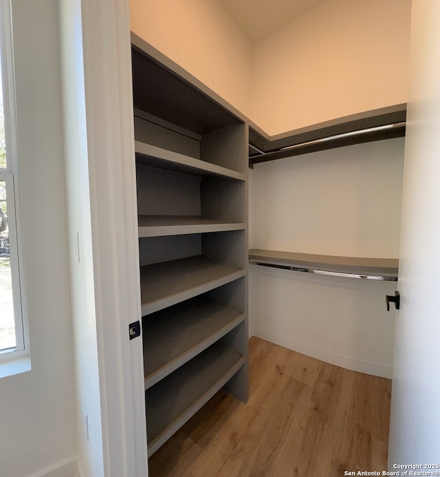 707 Lone Cir, San Antonio, TX 78260 - spacious closet with light wood finished floors