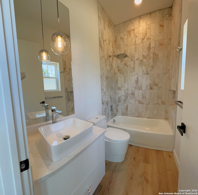 707 Lone Cir, San Antonio, TX 78260 - full bath featuring vanity,  shower combination, toilet, and wood finished floors