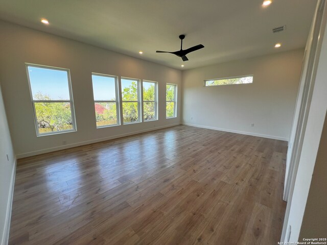 707 Lone Cir, San Antonio, TX 78260 - empty room with ceiling fan, visible vents, recessed lighting, wood finished floors, and baseboards