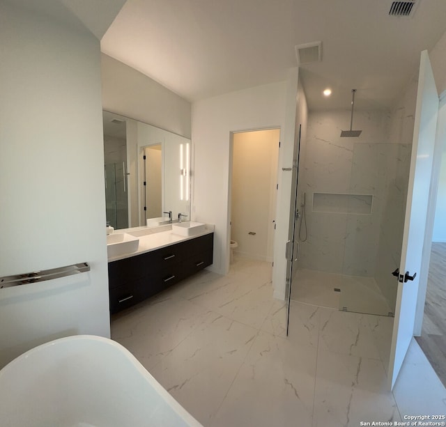 707 Lone Cir, San Antonio, TX 78260 - bathroom with toilet, double vanity, a marble finish shower, and a sink