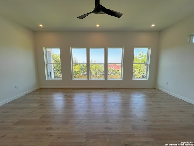 707 Lone Cir, San Antonio, TX 78260 - unfurnished room with recessed lighting, baseboards, wood finished floors, and ceiling fan