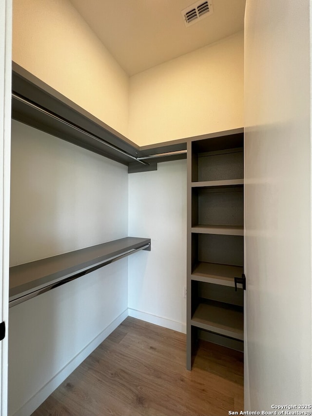 707 Lone Cir, San Antonio, TX 78260 - spacious closet featuring dark wood-type flooring and visible vents