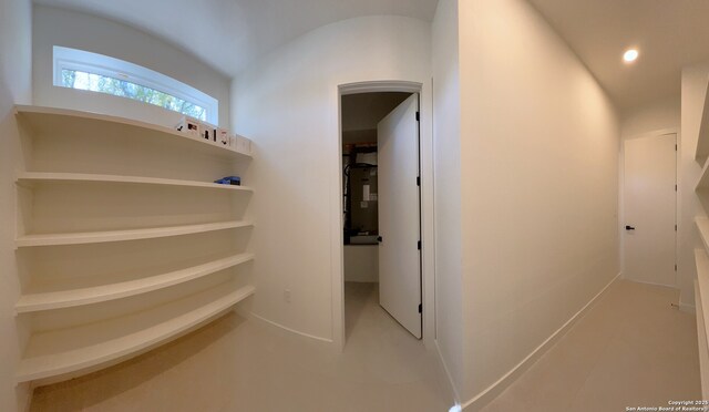 707 Lone Cir, San Antonio, TX 78260 - hall featuring arched walkways, baseboards, and recessed lighting