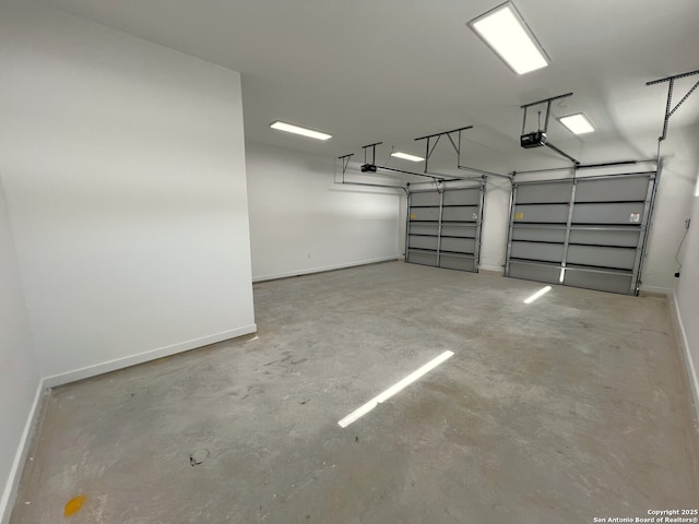 707 Lone Cir, San Antonio, TX 78260 - garage featuring a garage door opener and baseboards