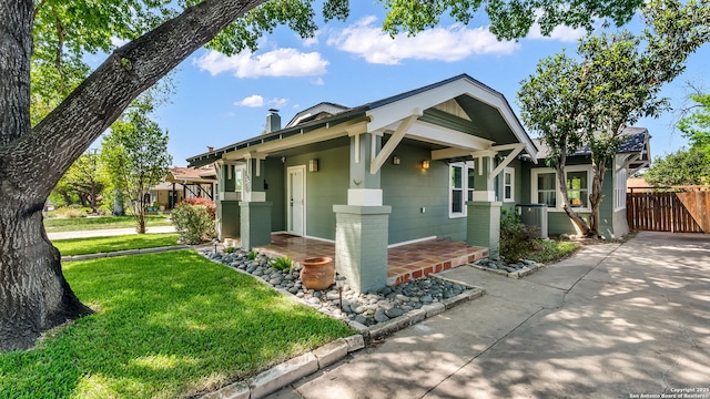 315 Carnahan, San Antonio, TX 78209 - view of front facade featuring a front yard and fence