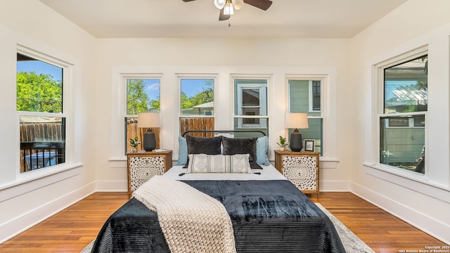 315 Carnahan, San Antonio, TX 78209 - bedroom with wood finished floors, baseboards, and a ceiling fan