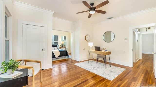 315 Carnahan, San Antonio, TX 78209 - office area with visible vents, baseboards, ceiling fan, crown molding, and light wood finished floors