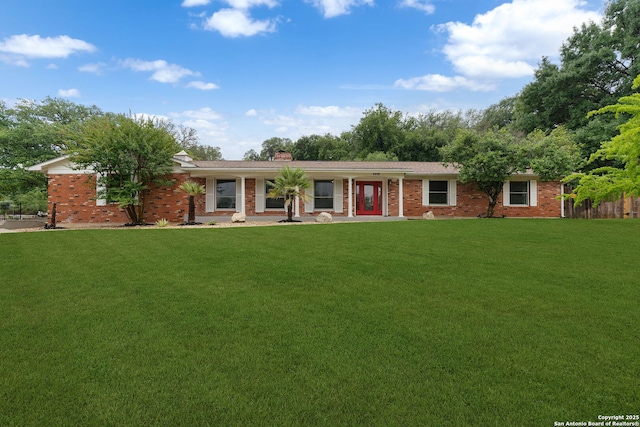 3918 Midvale, San Antonio, TX 78229 - ranch-style home featuring a front lawn, brick siding, and a chimney