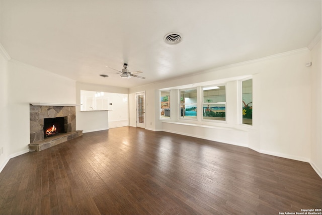 3918 Midvale, San Antonio, TX 78229 - unfurnished living room with ornamental molding, wood-type flooring, a ceiling fan, baseboards, and a fireplace